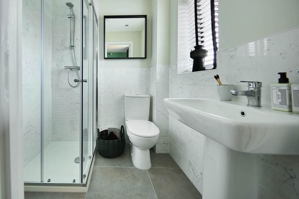 Bedroom 1 also hosts a private en suite shower...