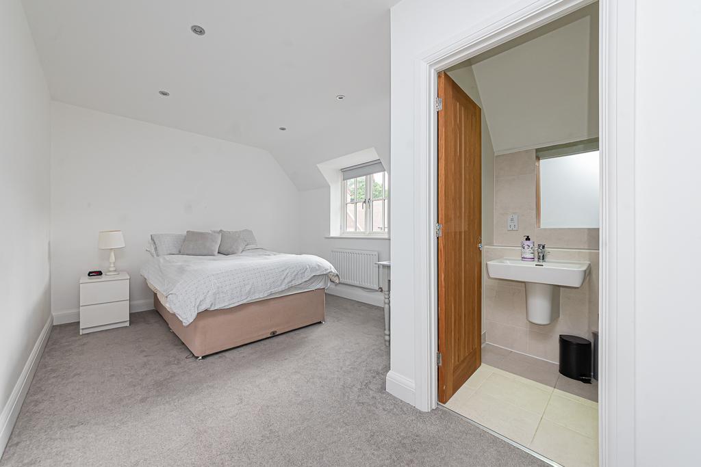 Bedroom 2 with wardrobes