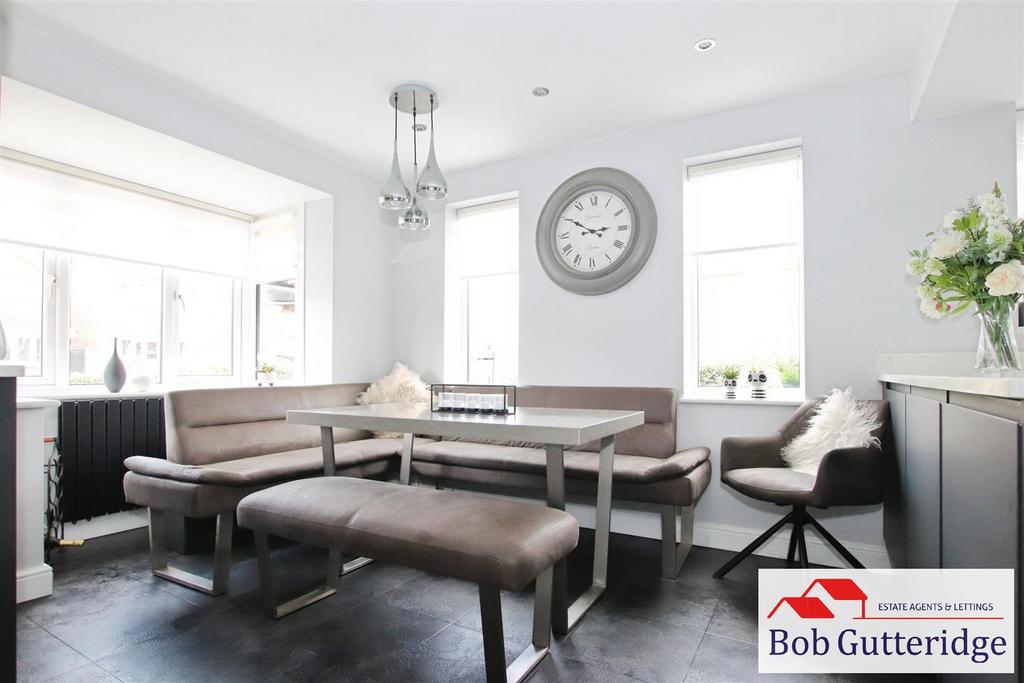 Open plan fitted kitchen / dining room