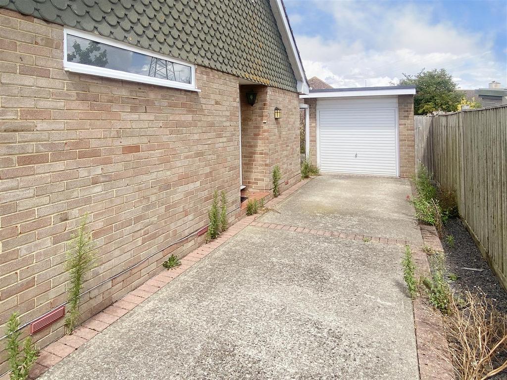 Long Driveway Leading to Garage