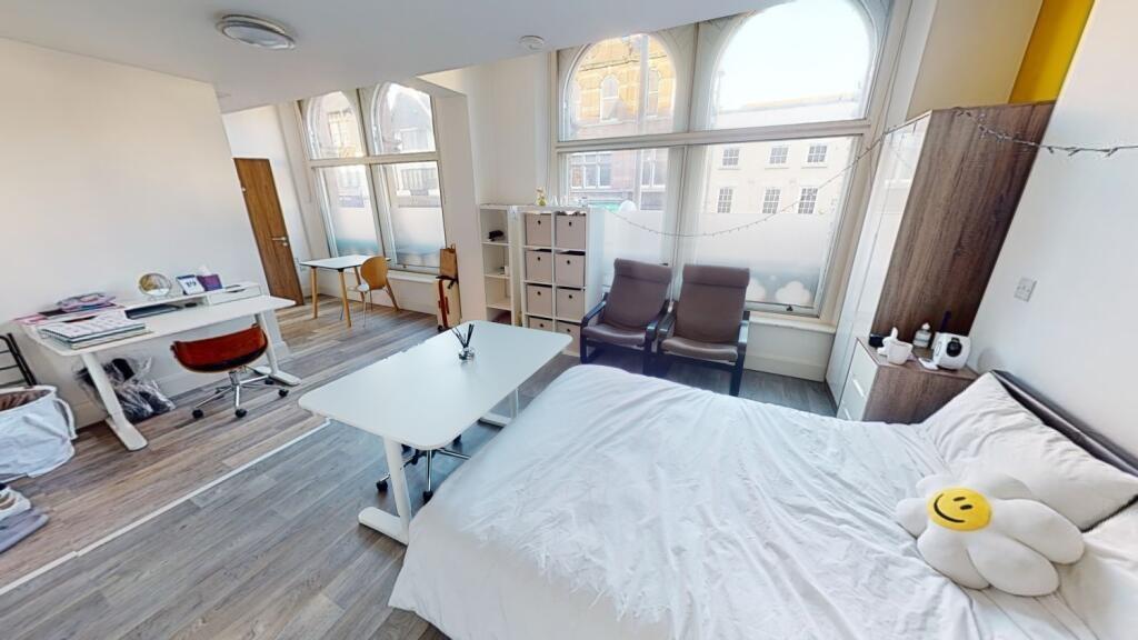 Spacious and inviting master bedroom featuring ...