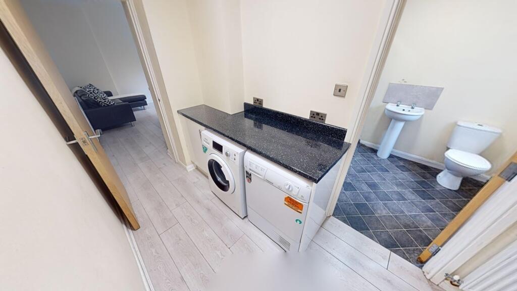 A neat and well-maintained bathroom featuring a...