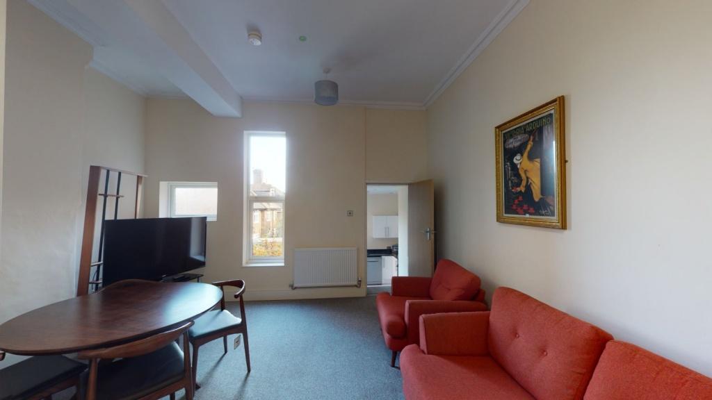 A bright and comfortable living room featuring ...