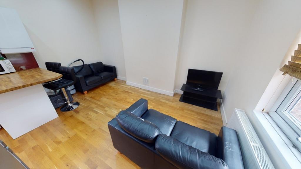 A spacious and inviting large modern living roo...