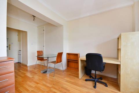 Studio to rent, Warren Court, Fitzrovia, London, NW1