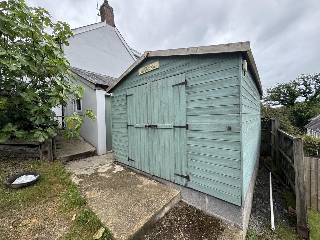 Timber Shed Adjoining House