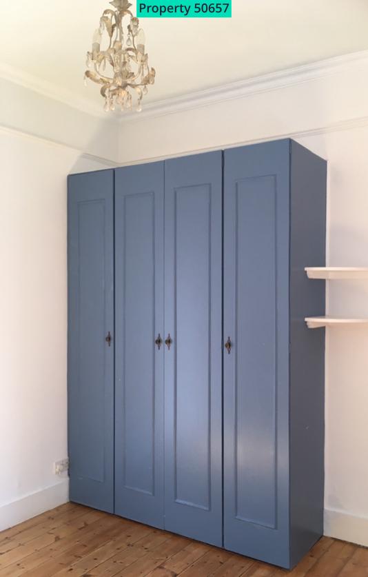 Full size fitted wardrobes in bedroom