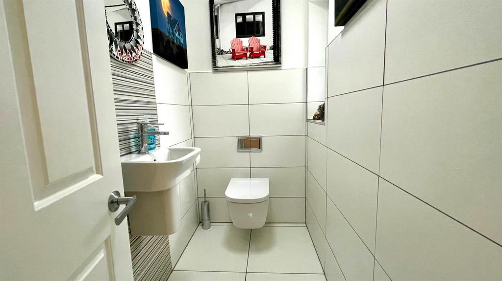 2 piece tiled cloakroom