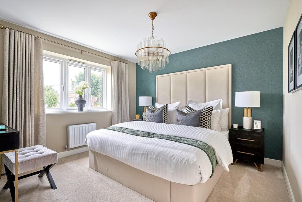 The king-size main bedroom offers lots of...