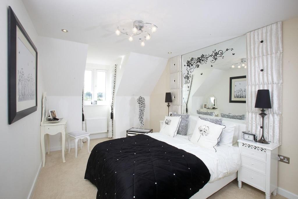 The top floor features a double bedroom,...