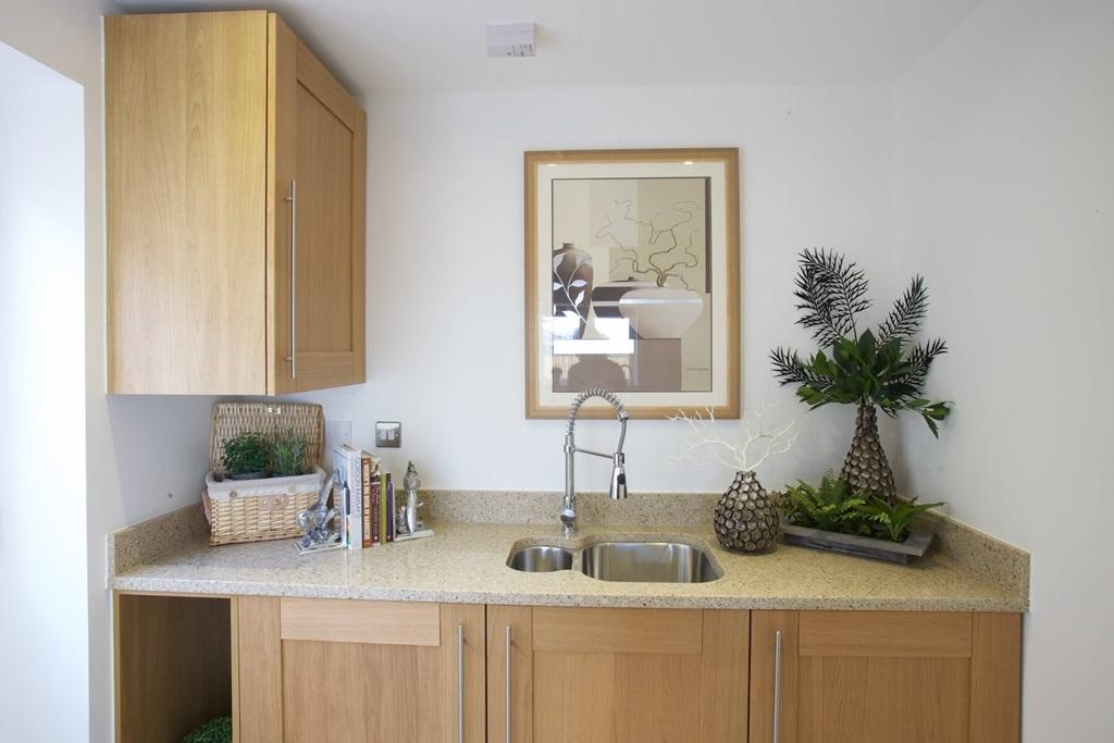 A utility area offers space for laundry...