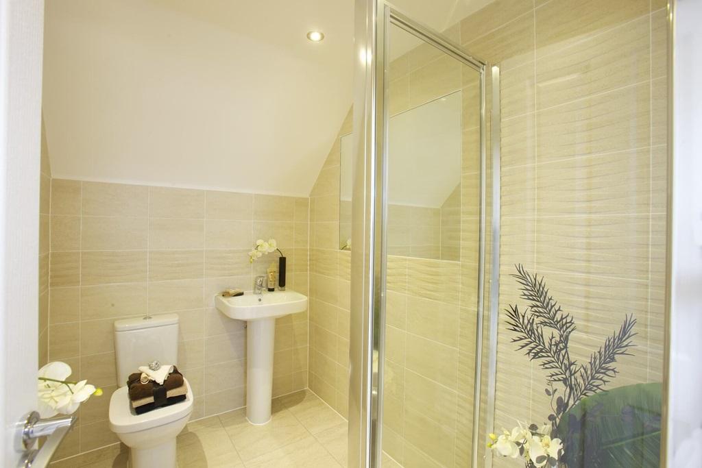 The private en suite of bedroom 1 offers a...