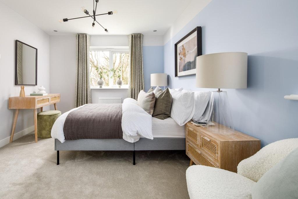 Bedroom one is flooded with natural light