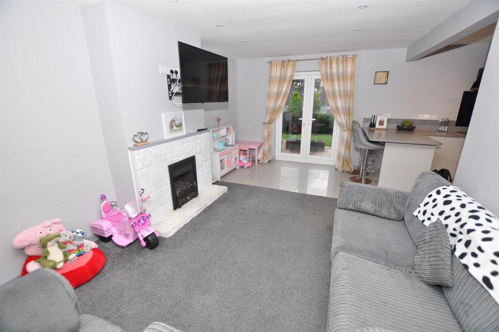 Lounge/Kitchen/Dining room which is “L” shaped