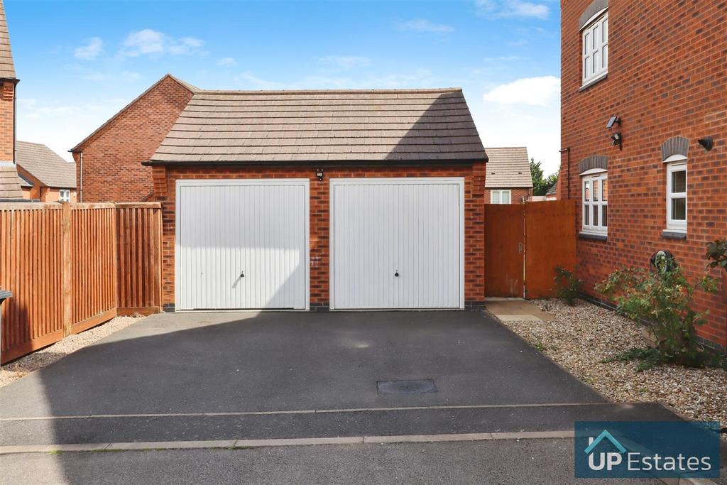 Double garage and driveway