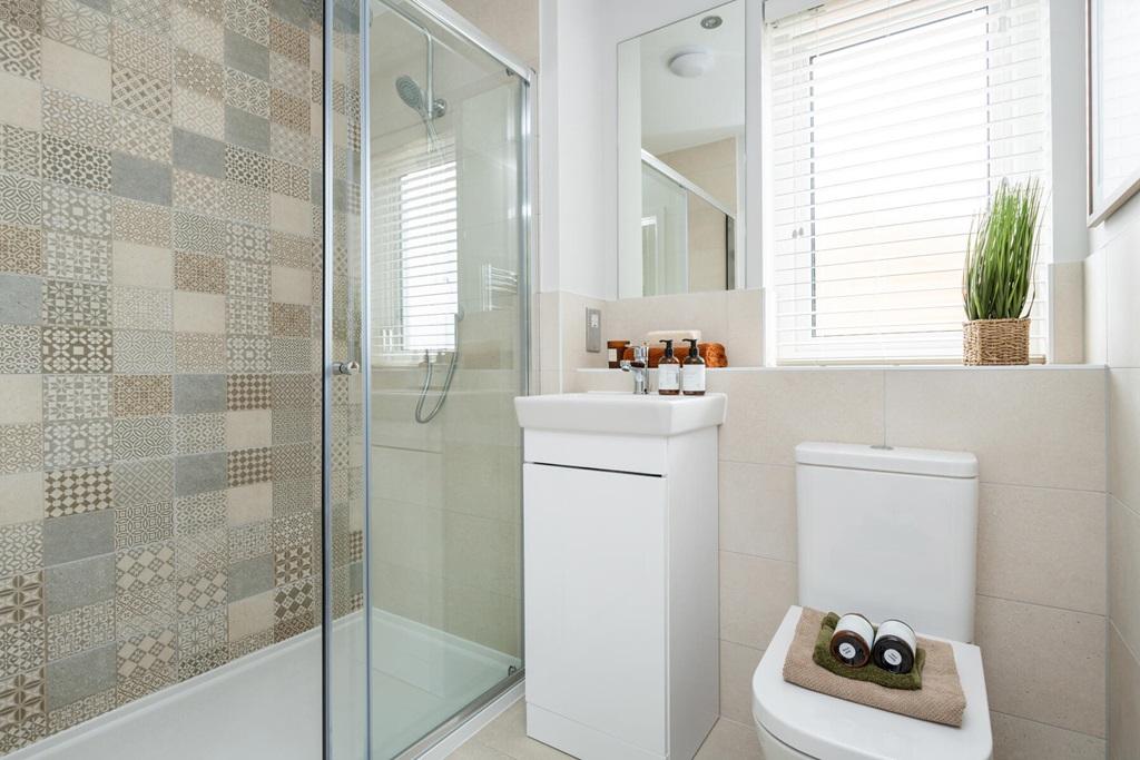 Two of the bedrooms boast en-suite shower rooms