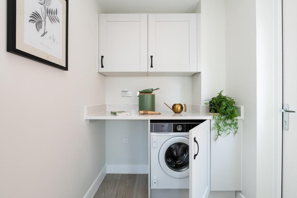 The utility room features an external door