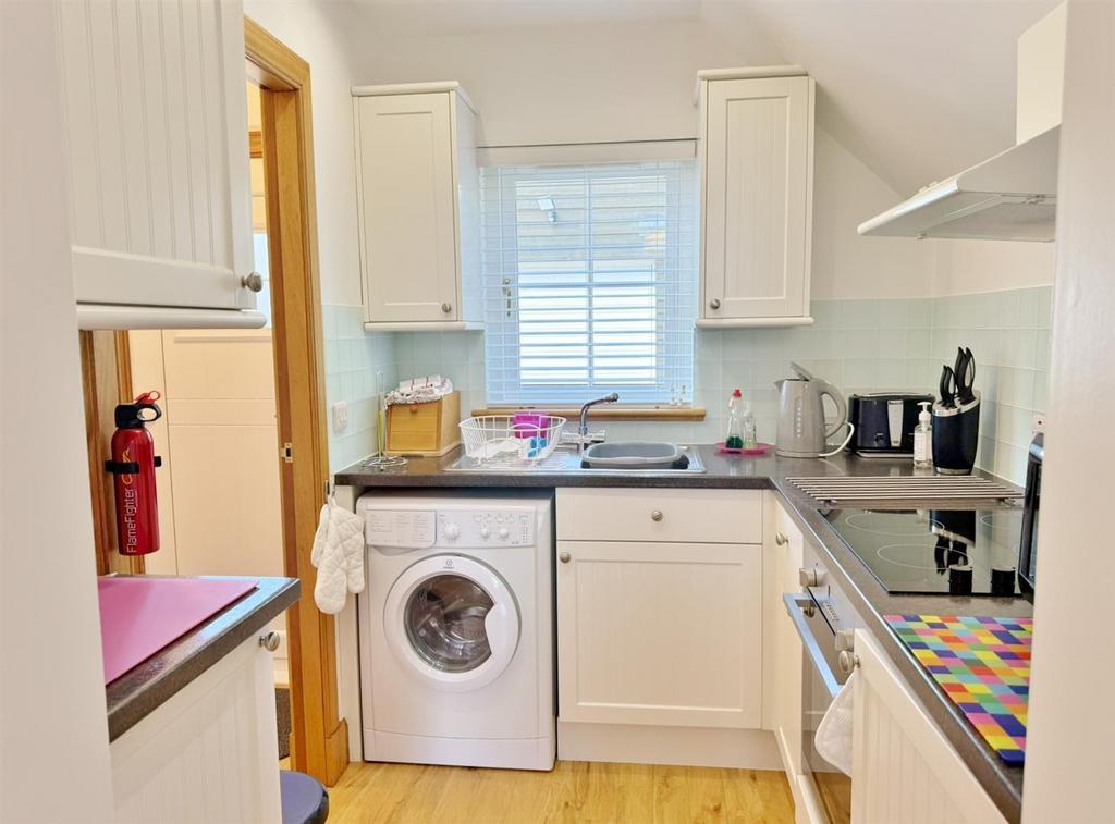 Little Wellingtonia kitchen from lounge area