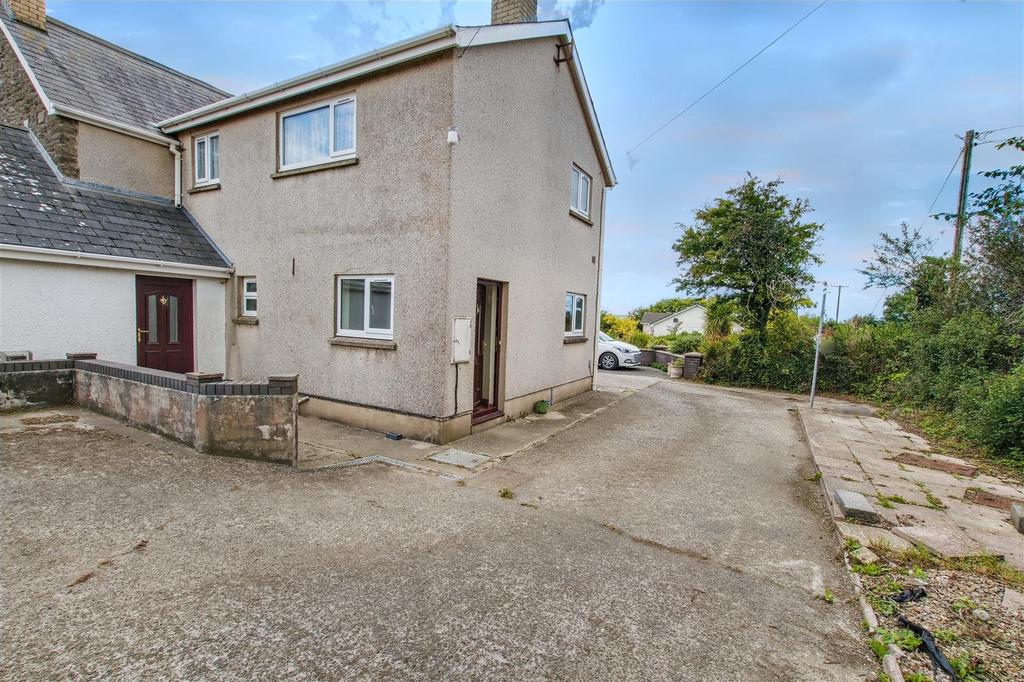 Drive and rear of house