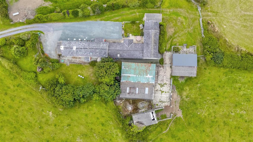 Roof top view of both houses & outbuildings