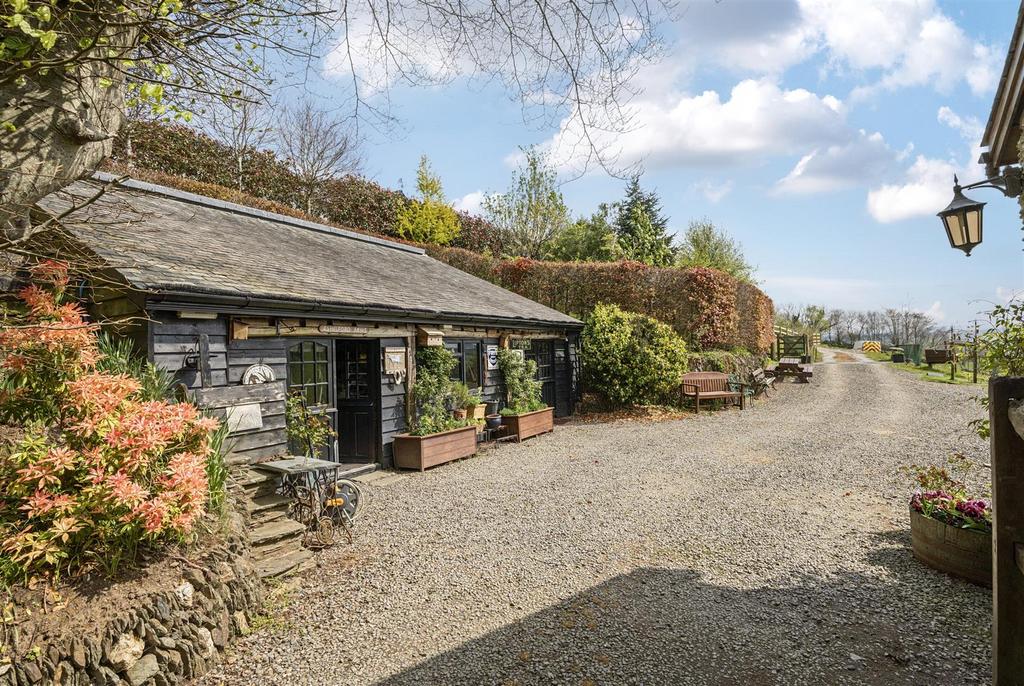 Outbuilding &amp; Driveway
