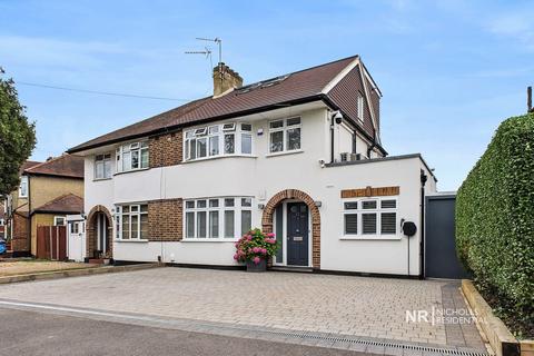 11 Rhodrons Avenue, Chessington, KT9 1BB