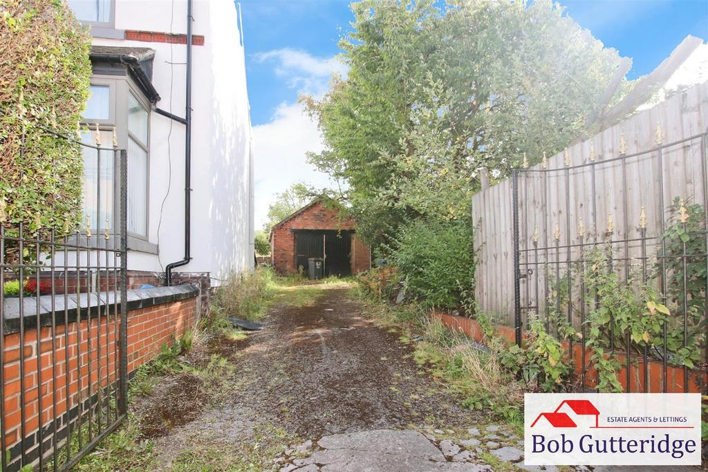 OFF ROAD PARKING & DETACHED BRICK GARAGE