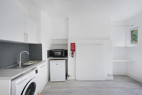 Studio to rent, Addison Gardens, London W14