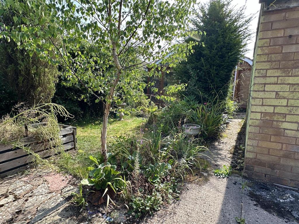 Rear garden to house