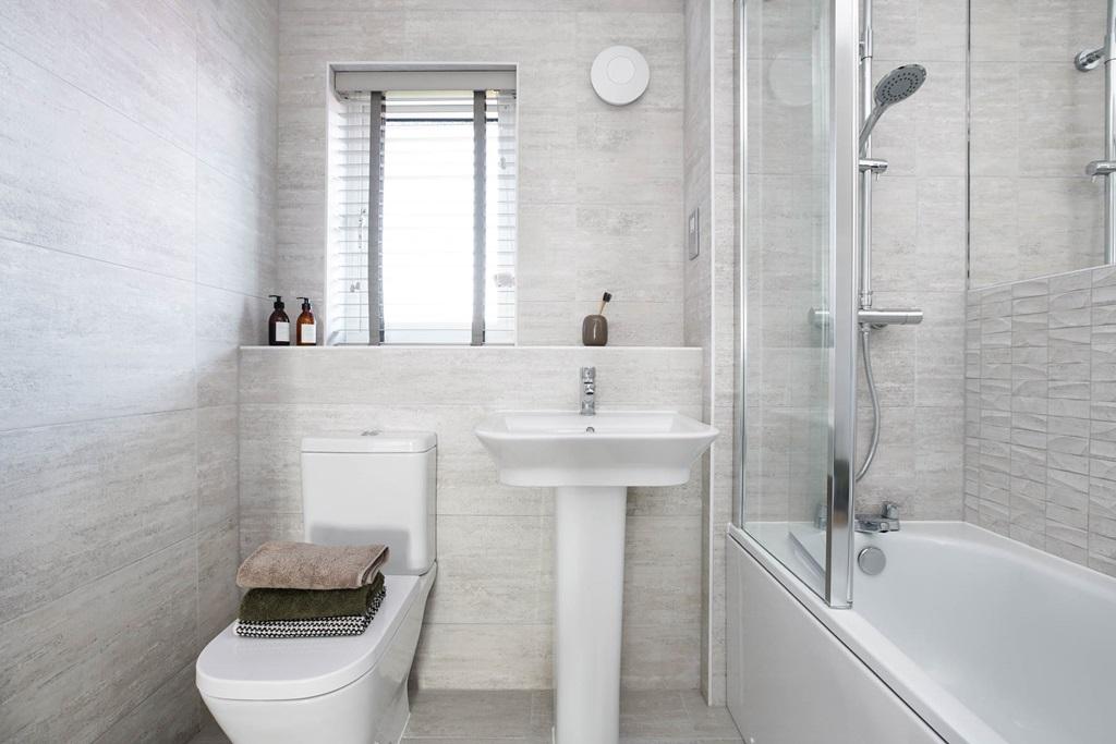 Bathroom with shower over bath - typical Taylor...