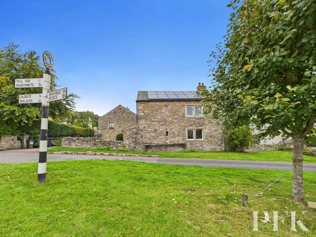 Across village green toward rear of the property