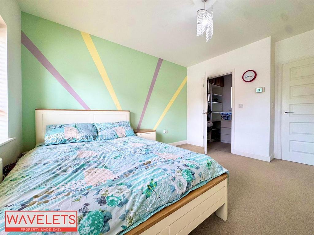 Master Bedroom With Walk In Wardrobe