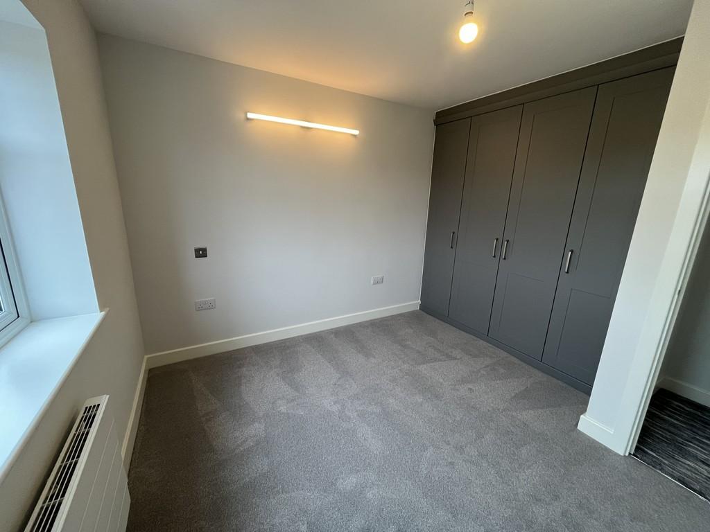 Second bedroom with en suite and wardrobes