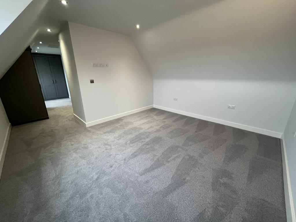 Second floor bedroom with dressing area
