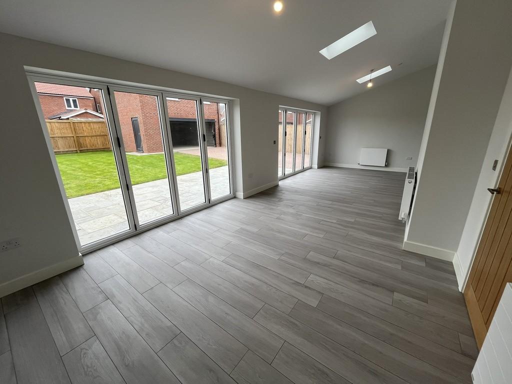 Rear sun room/diner/second living room