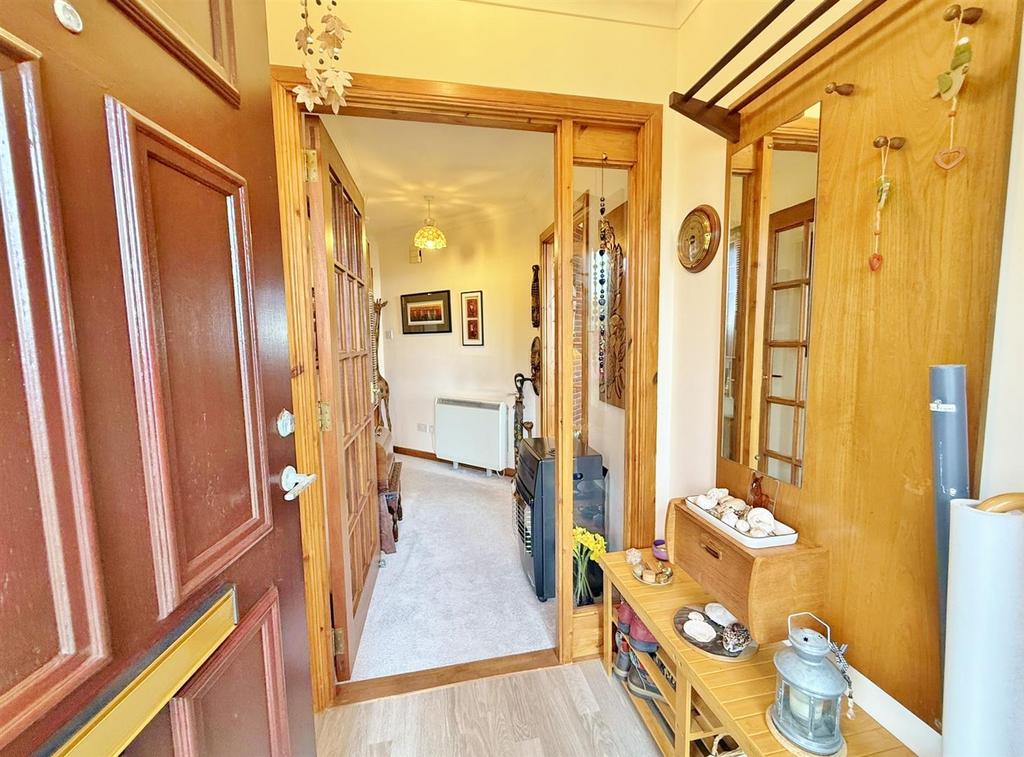 Front entrance vestibule to hallway