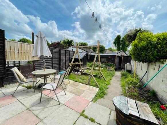 A bright and inviting garden space featuring a ...