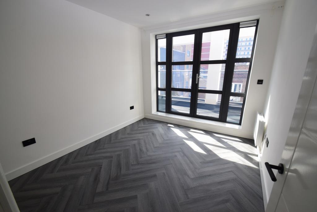 1 bedroom Second Floor Apartment with Balcony in