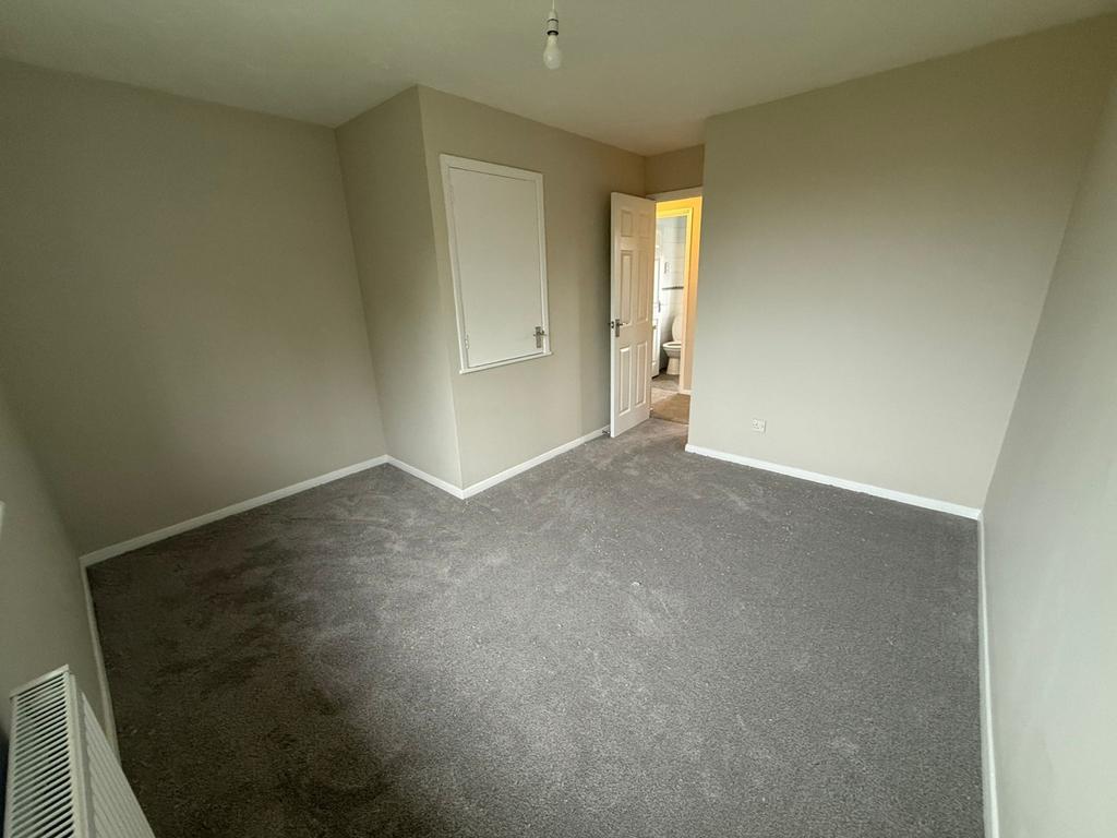 Carpeted bedroom 1