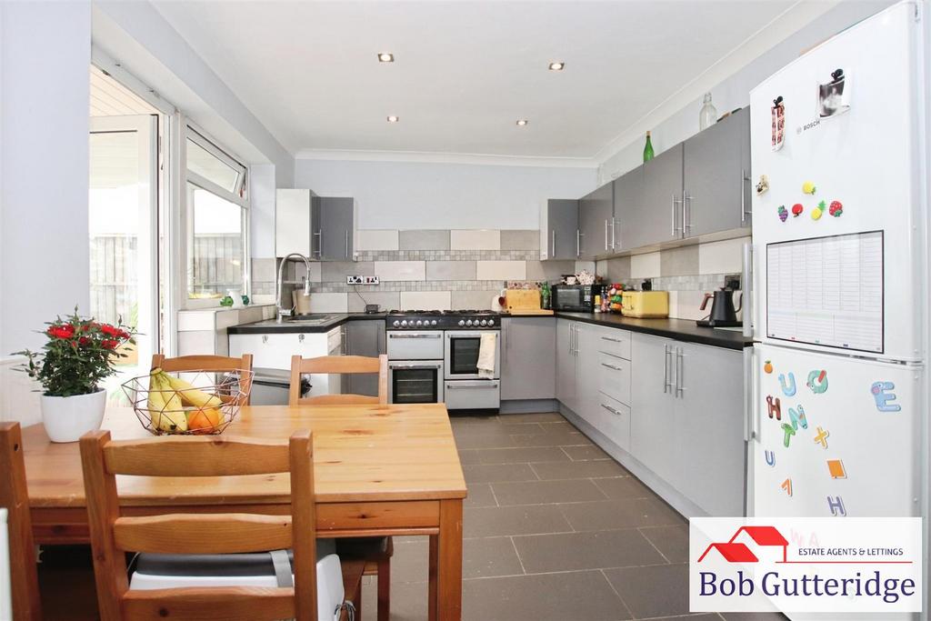 Open plan fitted kitchen / dining room