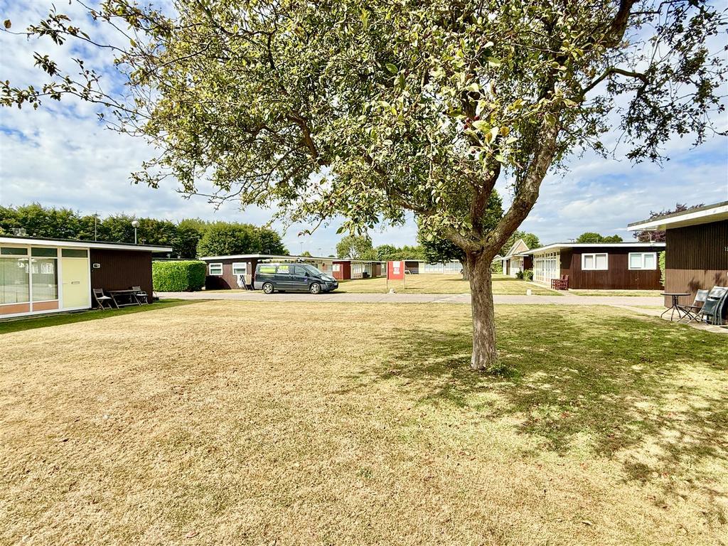 Communal grounds to front