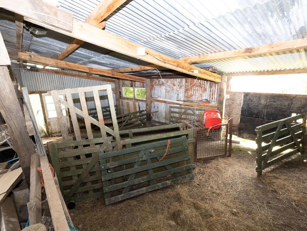 Hay barn with lean to