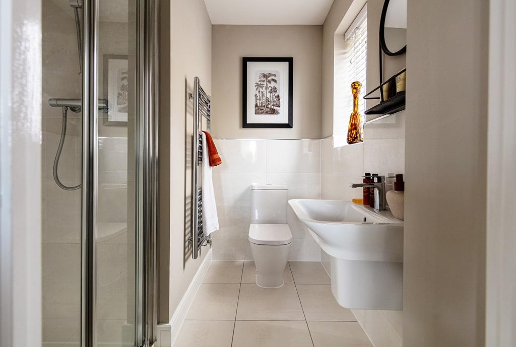 The main bedroom boasts an en-suite shower room