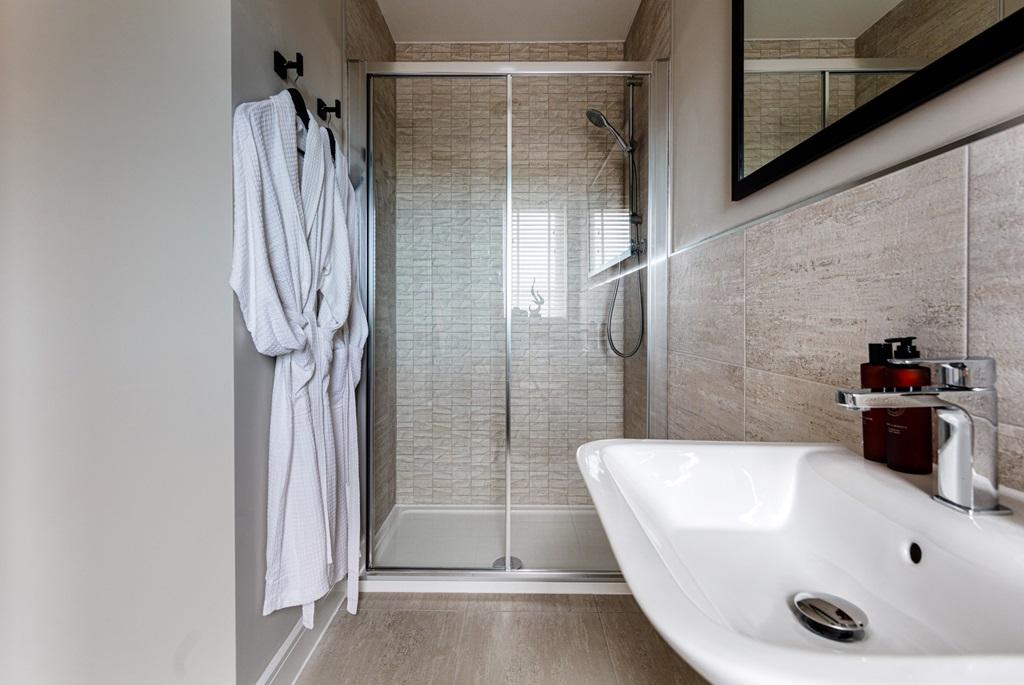 The second bedroom also boasts an en-suite...