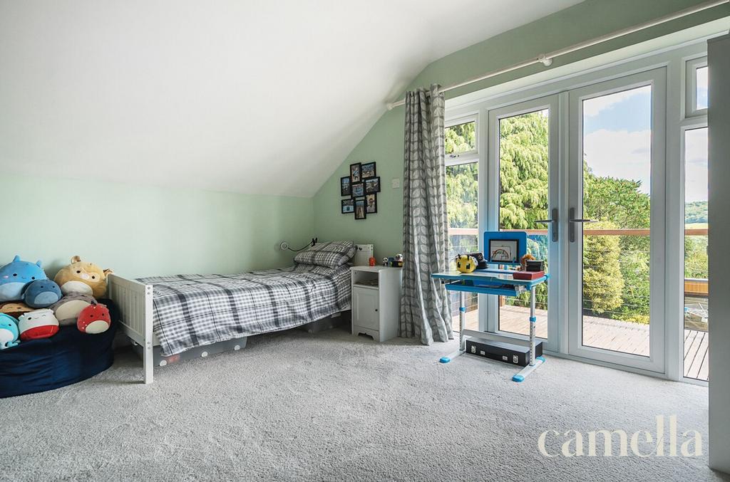 Bedroom Four With Balcony