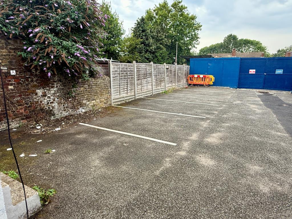 Parking spaces to rear
