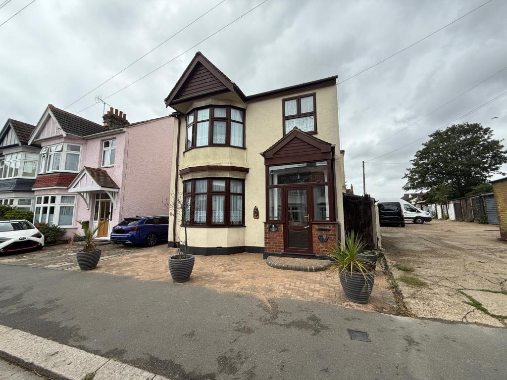 Block paved frontage leading to entrance and side