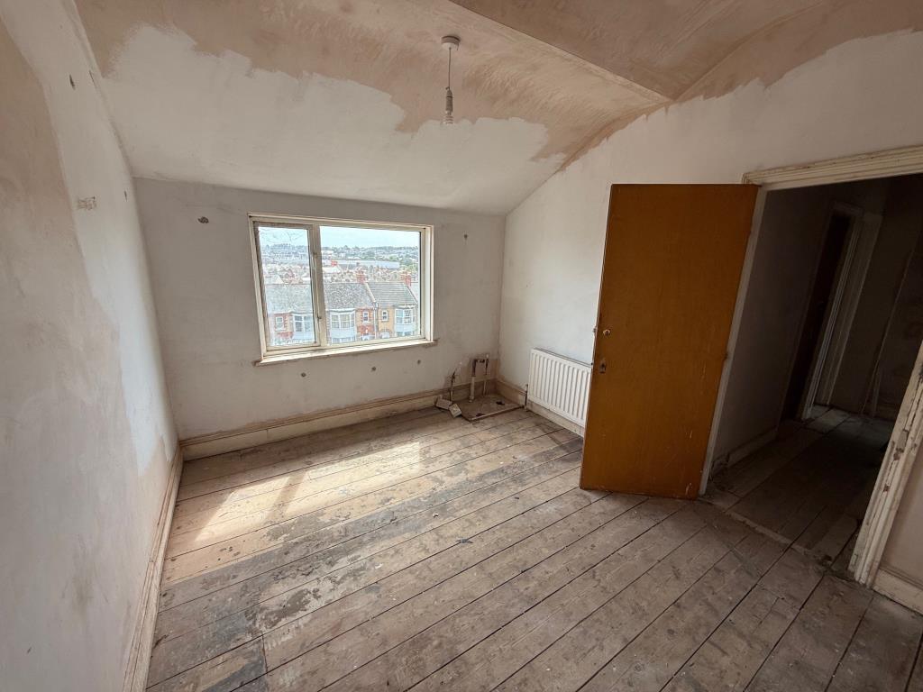 Second floor room with view in the background