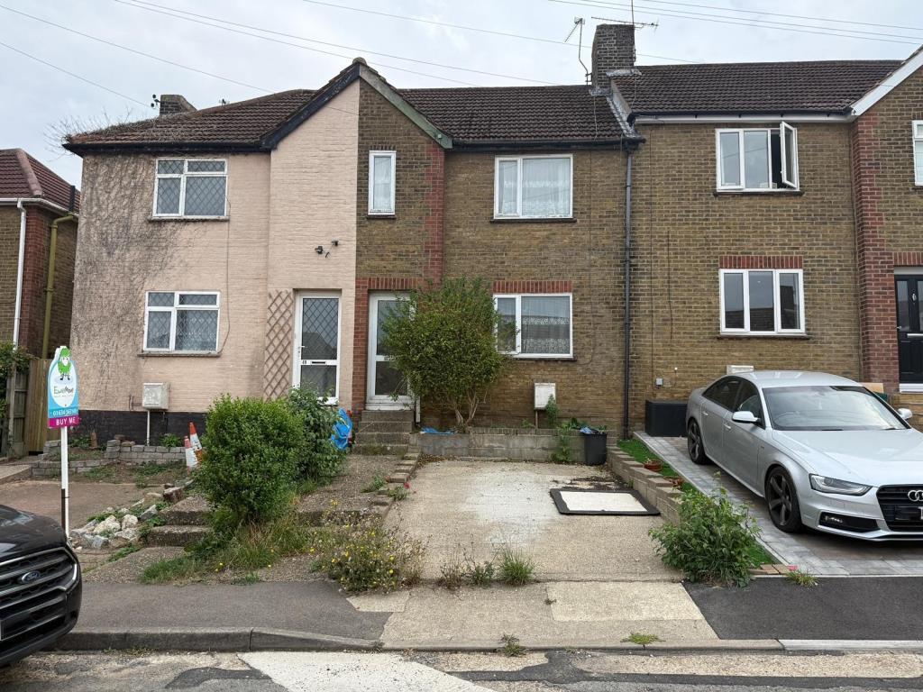 Mid-terrace house with parking