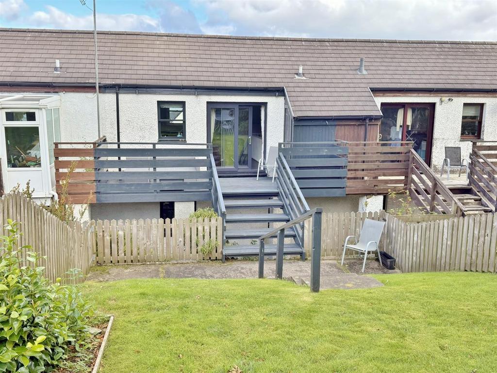 Patio doors and decking to the rear